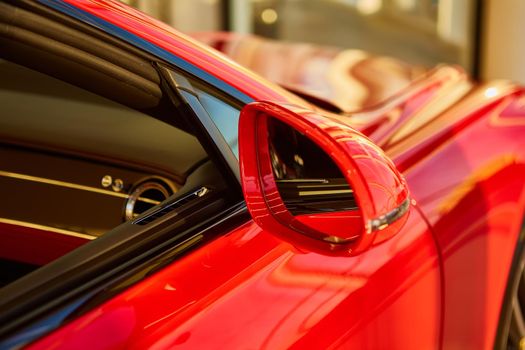 Side rear-view mirror on a modern car.