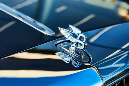 Kyiv, Ukraine - October 02, 2019: Bentley logo on the hood of Mulsanne. Mulsanne - launched in 2010 - is the only model of Bentley, carrying the Flying B distinctive hood ornament