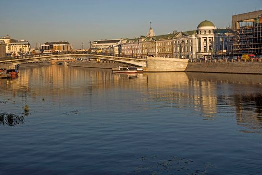 Moscow, Russia, - September, 24, 2021 , Russian scene: River trips on the Moscow river, view for the Vodootvodny canal in Moscow near Bolotnaya square at dusk