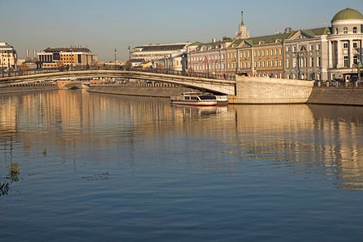 Moscow, Russia, - September, 24, 2021 , Russian scene: River trips on the Moscow river, view for the Vodootvodny canal in Moscow near Bolotnaya square at dusk