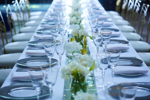 Fancy wedding reception area ready for guests and the party. Shallow dof