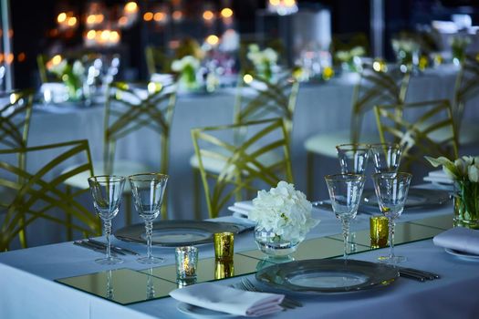 Fancy wedding reception area ready for guests and the party. Shallow dof