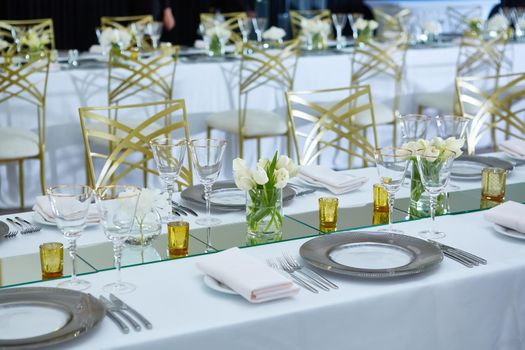Beautifully organized event. Served festive table ready for guests. Shallow doff