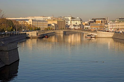 Moscow, Russia, - September, 24, 2021 , Russian scene: River trips on the Moscow river, view for the Vodootvodny canal in Moscow near Bolotnaya square at dusk