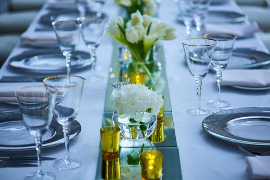 Fancy wedding reception area ready for guests and the party. Shallow dof