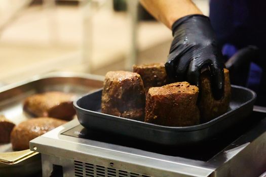 The beef steak in a frying pan. Shallow dof.