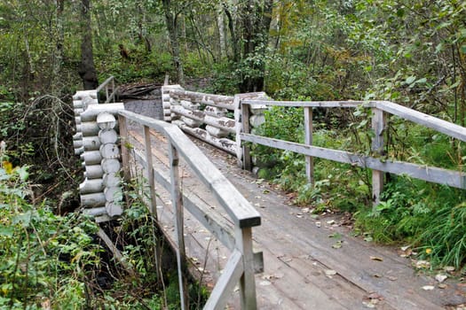 Wooden bridge over the Kulismayoki river at the White Bridges waterfall, Pitkaranta district