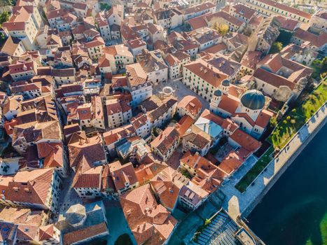 Old city. Kotor. Montenegro. Narrow streets and old houses of Kotor at sunset. View of Kotor from the city wall. View from above.