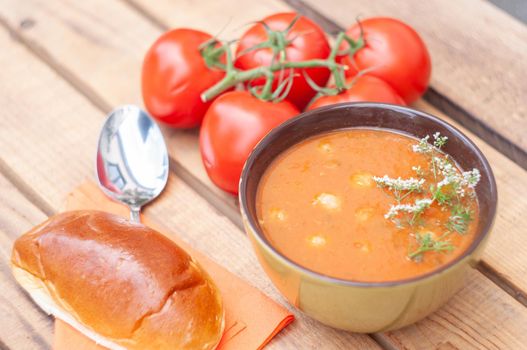 tomato soup with meat balls, a traditional Belgian dish, served with a bun, exotic food. High quality photo