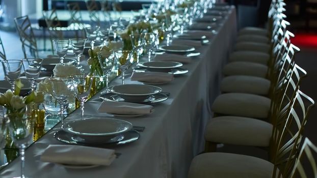 Beautifully organized event. Served festive table ready for guests. Shallow doff
