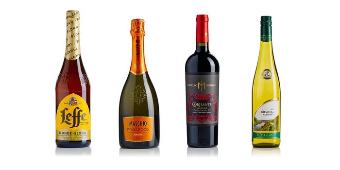 Tallinn, Estonia, march 2022. Set of alcohol branded bottles. Leffe beer, Maschio prosecco, Castello Monaci wine, Moselland Riesling wine. Isolated on white background.
