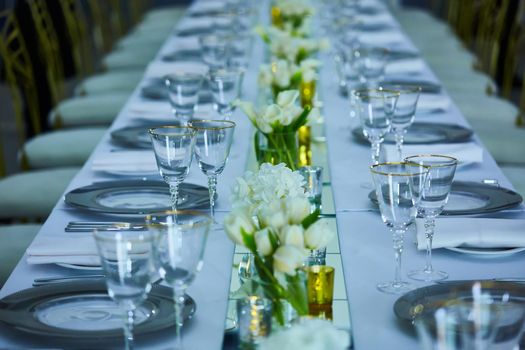 Fancy wedding reception area ready for guests and the party. Shallow dof