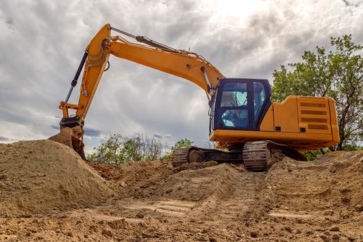 Big excavator with shovel at construction site. Horizontal view