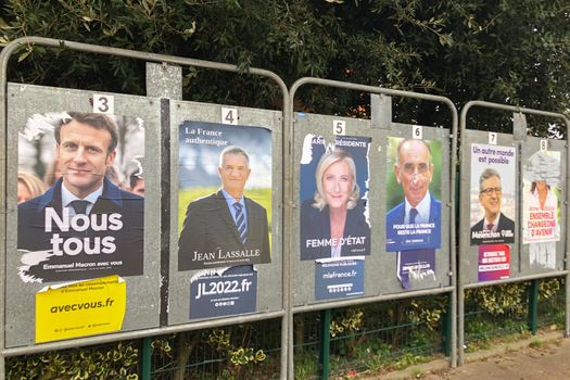 PARIS, FRANCE - APRIL 06, 2022 : The banners with candidates for President elections