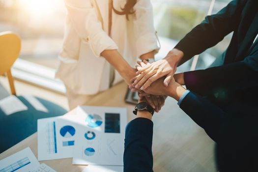 Teamwork business join hand together concept, Business team standing hands together, Volunteer charity work. People joining for cooperation success business.
