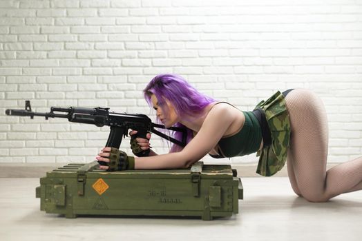 girl with colored hair in a short sexy miliriti skirt with an ak-47 Kalashnikov assault rifle