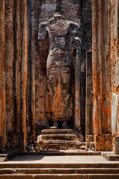 Ruins of Lankatilaka Vihara - temple with Buddha image. Ancient city of Pollonaruwa - famous tourist attraction and archaelogical site, Sri Lanka