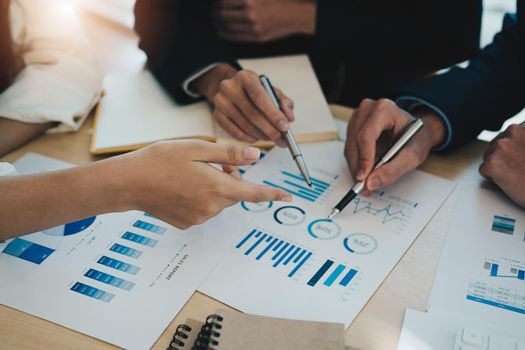 Business people consulting meeting working and brainstorming new business project finance investment concept. Analyzing business information graph chart.