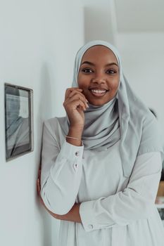 African woman using a smart home screen control system. High-quality photo