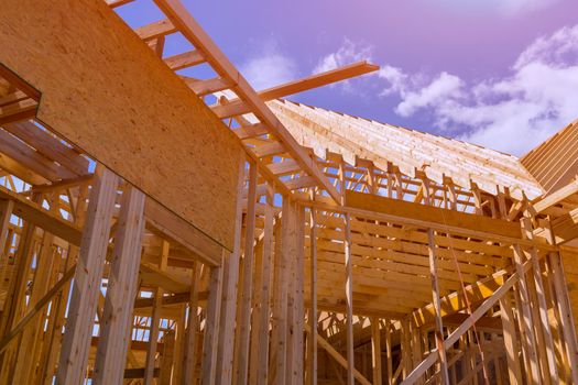 Framed residential home with construction of a timber wooden frame house