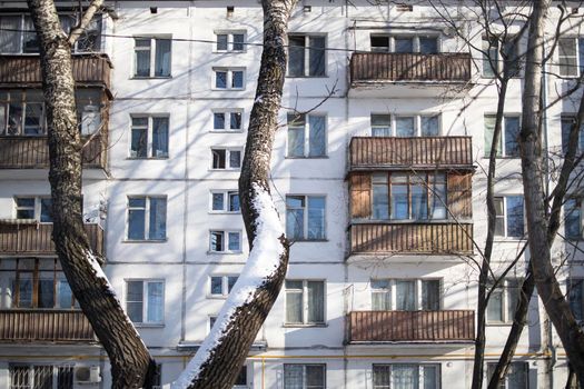 Moscow, Russia - 02 February 2021, Five-storey block buildings with balconies in the Preobrazhenskaya square, built in the sixties, in good winter weather.