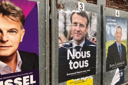 PARIS, FRANCE - APRIL 06, 2022 : The banners with candidates for President elections
