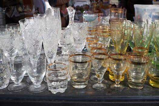 Moscow, Russia - 04 September 2021, Various glass glasses are sold at the weekend flea market at the Museum of Moscow