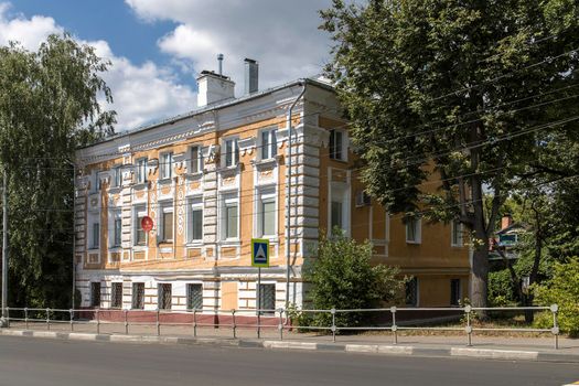 Serpukhov, Russia - June 18, 2021: A two-story merchant mansion painted yellow on Voroshilov Street