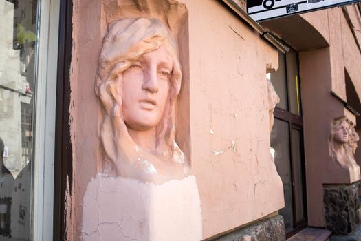 Saint Petersburg, Russia - 9 August 2021, House of Nikolaevs at 25 Sadovaya Street with bas-reliefs of women in the Art Nouveau style