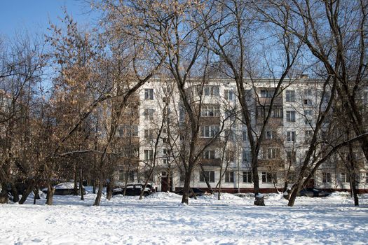 Moscow, Russia - 02 February 2021, Five-storey block buildings with balconies in the Preobrazhenskaya square, built in the sixties, in good winter weather.