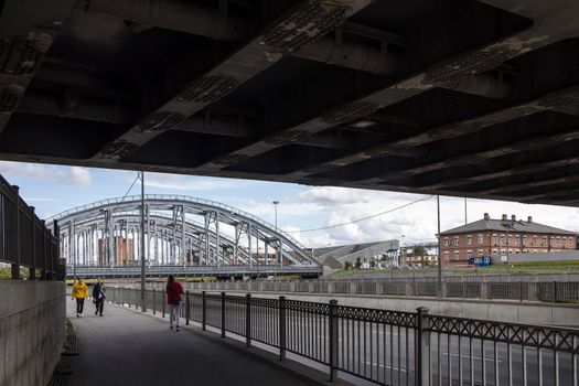 Saint Petersburg, Russia - August 17, 2021: American bridges. Embankment of the Obvodny Canal.