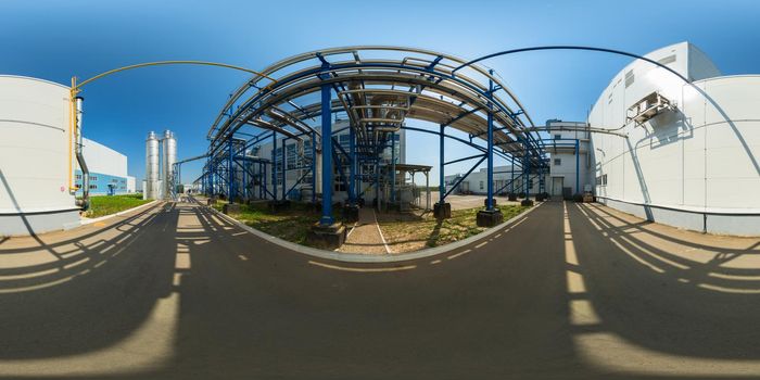 Spherical panorama of outdoor coolant pipeline infrastructure. Full spherical (360 by 180 degree) panorama in equirectangular projection.