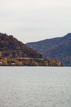 View of Danube river and Orsova city vegetation and buildings, waterfront view. Orsova, Romania, 2021