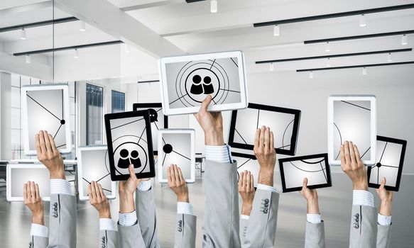 Set of tablets in male hands in modern office interior. 3d rendering