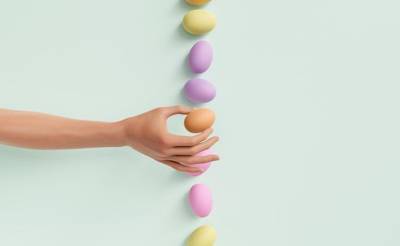 hand picking an egg from a line of colorful easter eggs. 3d rendering