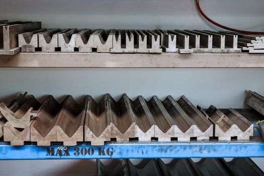 CNC sheet metal bending tool. Equipment for bending sheet metal on a CNC machine.