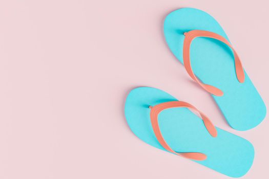 pastel colored flip flops on one side with space for text. summer concept. 3d rendering
