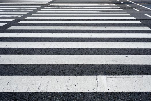 Crosswalk pedestrian crossing on asphalt road in the street