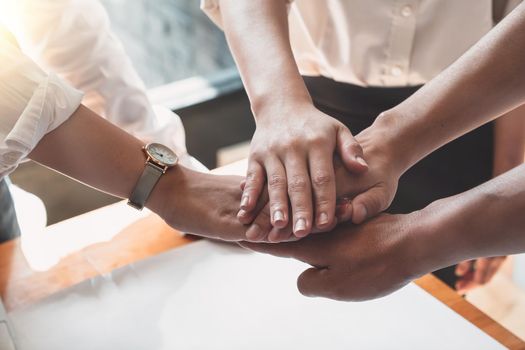 Teamwork Success. Business people group team happy showing teamwork and joining hands after meeting partner business in office. Business Concept..N