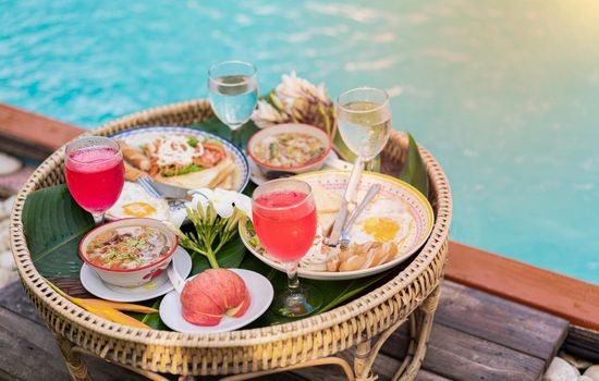 Float breakfast at the swimming pool for traveler at the Hotel.  Food for holiday