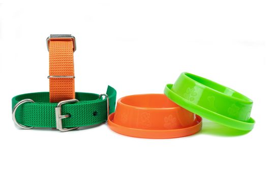 Pet Collars with bowls on isolated white.