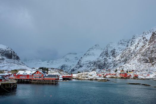 Traditional fishing village A on Lofoten Islands, Norway with red rorbu houses. With snow in winter