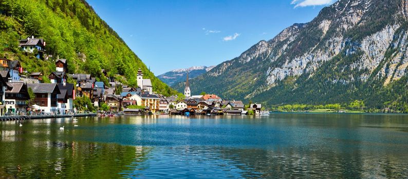 Austrian tourist destination - panorama of Hallstatt village and Hallstatter See mountain lake in Austria in Austrian alps. Salzkammergut region, Austria