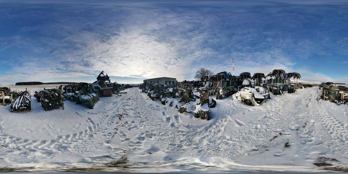 Disassembled cars on a car dump are on sale for spare parts. Full seamless spherical hdr panorama 360 degrees angle view in equirectangular projection, ready AR VR virtual reality content.