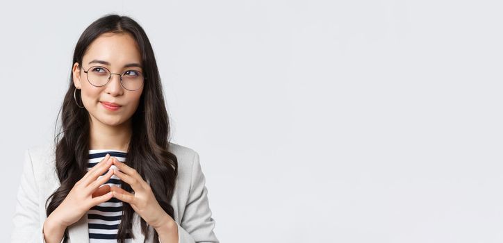 Business, finance and employment, female successful entrepreneurs concept. Close-up of smart and creative businesswoman having plan, steeple fingers, scheming something interesting.