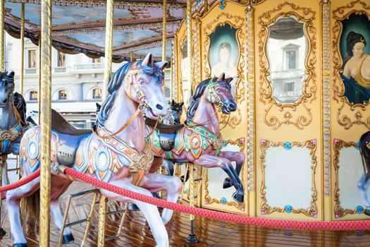 Florence, Italy - Circa March 2022: vintage carousel horse - antique attraction