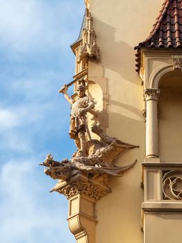 PRAGUE, CZECH REPUBLIC - FEBRUARY 20, 2015 - Sculpture of St George and dragon on a corner of a house