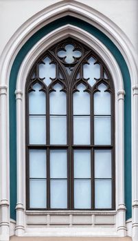 Ornamented window of a cathedral in gothic style