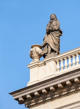 Statue on a roof of Concert and gallery center Rudolfinum, Prague, Czech Republic