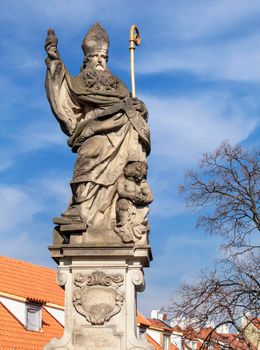 Statue of St. Augustinus on the Charles bridge in Prague, Czech Republic